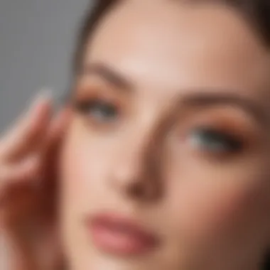 A close-up of a woman applying eyelash tint with precision