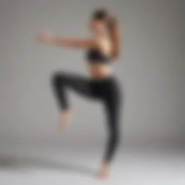 A woman demonstrating yoga poses in cutout yoga pants