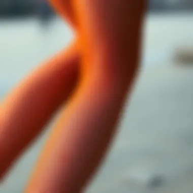 Close-up of vibrant orange fish net stockings showcasing intricate patterns