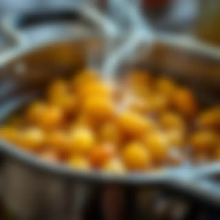 A close-up of wax beans melting in a pot, demonstrating their transformation