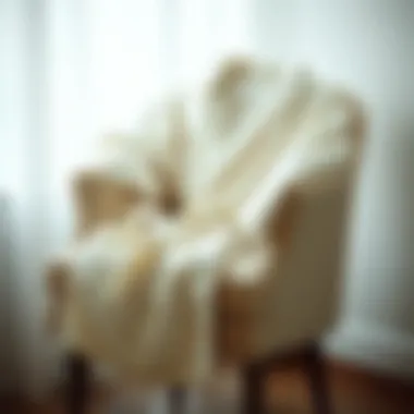 Elegant white bathrobe draped gracefully on a plush chair